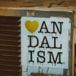 white and yellow wooden signage