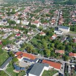 Aerial shot capturing the scenic landscape and architecture of Sajószentpéter, Hungary.